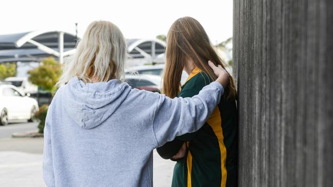 Golden Grove High School student Ella Barry and her mum Yvonne talking about a TikTok video rating year 7 boys and girls. Picture: Brenton Edwards