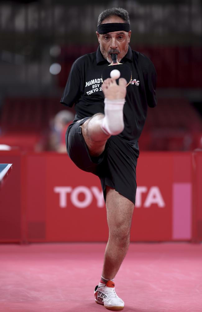 Ibrahim Hamadtou of Team Egypt serves against Hong Kyu Park of Team Republic of Korea