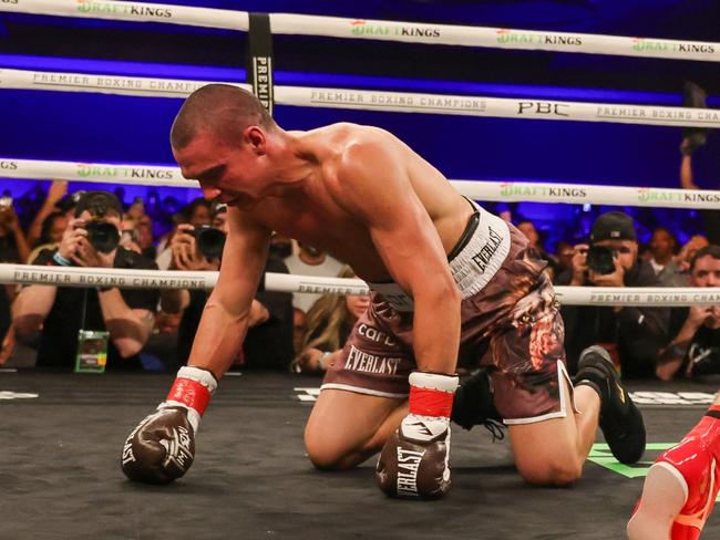 ORLANDO, FLORIDA - OCTOBER 19: Bakhram Murtazaliev walks to the corner after knocking down Tim Tszyu at Caribe Royale Orlando on October 19, 2024 in Orlando, Florida. (Photo by Alex Menendez/Getty Images)