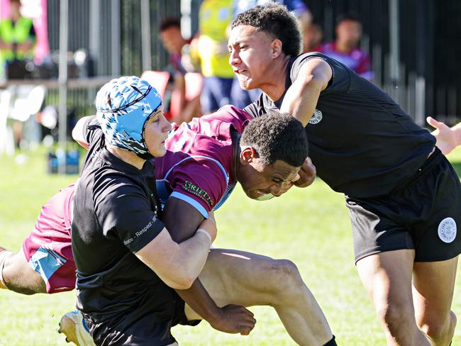 6/5/25 Hills SHS  (Marron and blue) v Central Coast SC (Black) in round 1 of Peter Mulholland Cup at Woy Woy Oval. Picture: Adam Yip