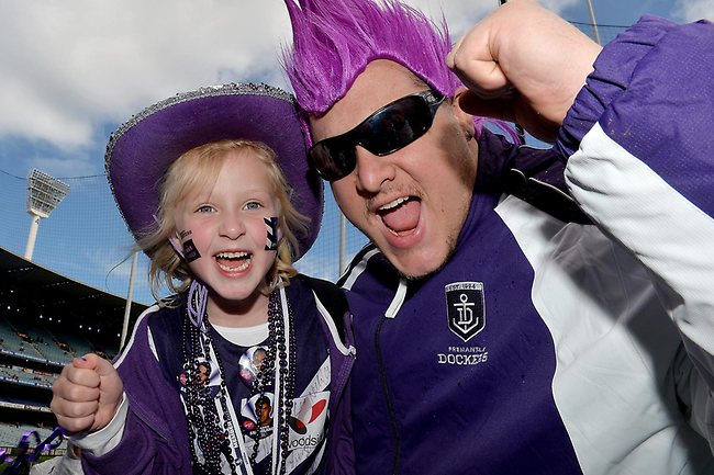 Dockers fans Amy de Wit with her uncle Mark Hambling from Geelong at the MCG for the 2013 AFL Grand Final. Picture: Nicole Garmston