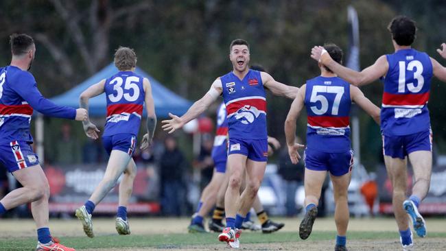 Wandin players celebrate on the final siren. Picture: Mark Dadswell