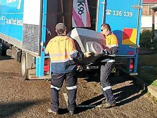 Council workers pick up what’s left after street raiders came calling.