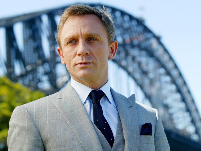 Daniel Craig on a visit to Sydney. He said he would rather kill himself than play James Bond again. But there is a teacher in north Sydney who could take his place. Picture: AP Photo/Paul Miller