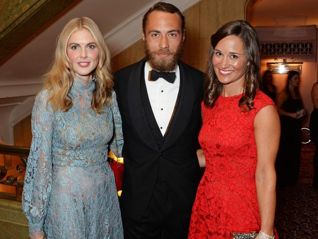 Pippa Middleton (right) is allowing her brother James Middleton (centre) to bring his girlfriend Donna Air (left) to her wedding. Picture: David M. Benett/Getty Images