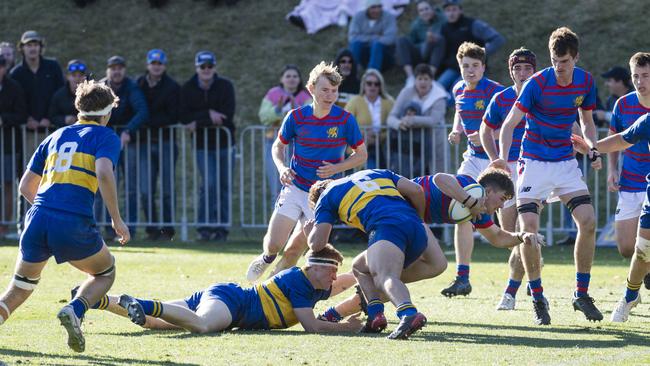 Heath Lindenmayer with the ball for Downlands. Picture: Kevin Farmer