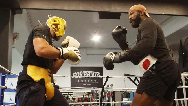 Huni (left) gets used to sparring the taller Julius Long. Picture: Liam Kidston