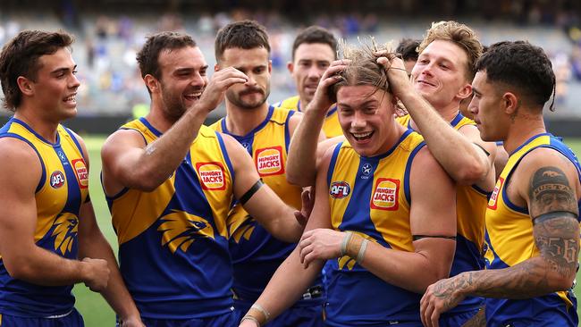 Teammates get around Harley Reid. Photo by Paul Kane/Getty Images