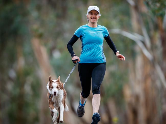 Nicola Spurrier on a run with dog Daisy at Belair National Park. Picture: Matt Turner