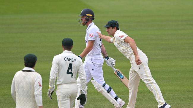 Australian captain Pat Cummins consoles Ben Stokes after another masterclass from the England captain. Picture: Getty