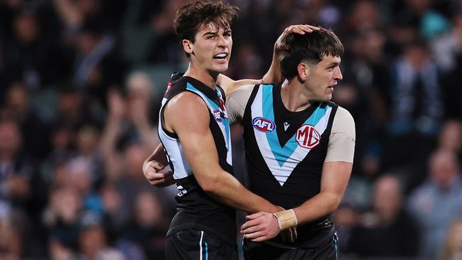 ADELAIDE, AUSTRALIA - JUNE 15: Connor Rozee and Zak Butters of the Power celebrate a goal during the 2023 AFL Round 14 match between the Port Adelaide Power and the Geelong Cats at Adelaide Oval on June 15, 2023 in Adelaide, Australia. (Photo by James Elsby/AFL Photos via Getty Images)