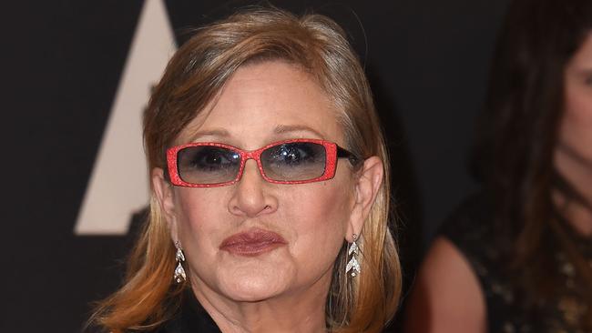 Actresses Carrie Fisher attends the 7th Annual Governors Awards honoring Spike Lee, Gena Rowlands and Debbie Reynolds, in Hollywood, California, on November 14, 2015.AFP PHOTO /VALERIE MACON