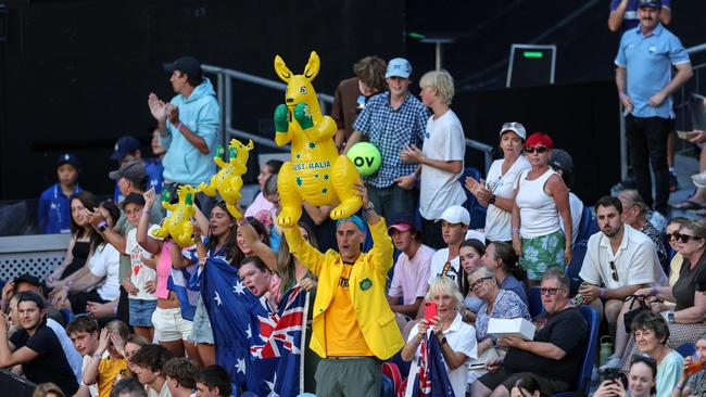 People with unreserved seats needed a wristband to enter the arena. Picture: Adrian Dennis / AFP