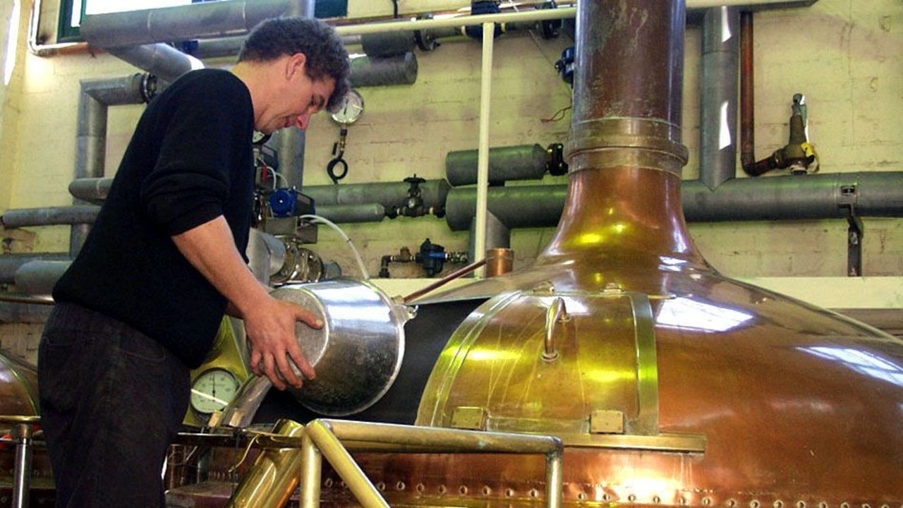 A worker at Lion Nathan's Malt Shovel Brewery at Camperdown in Sydney back in 2004. Picture: News Corp