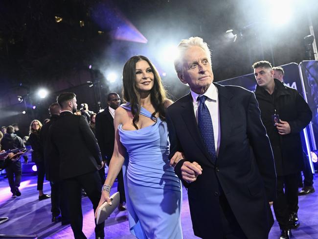 Michael Douglas, with Catherine Zeta-Jones, has pledged money to help victims of the LA wildfires. Picture: Getty Images for Disney