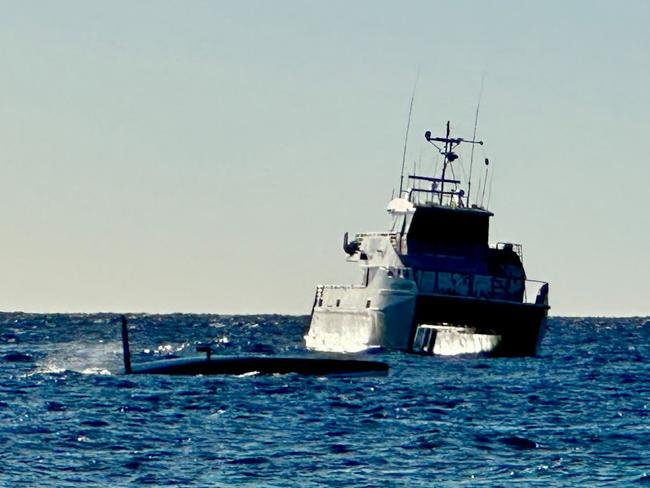 Police boat at Lady Elliot Island helping with search efforts.