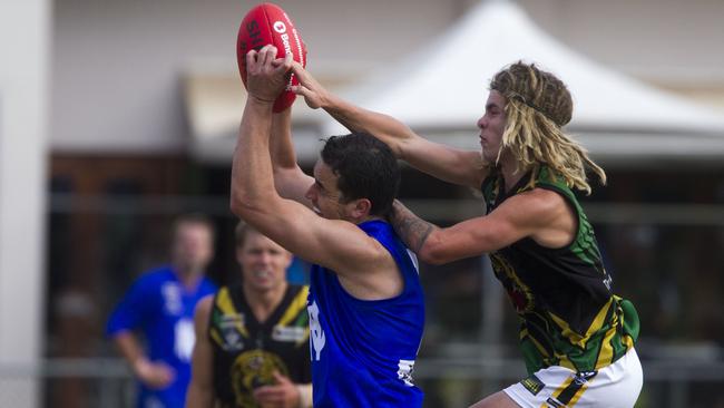 Hastings captain Paul Rogasch marks in front of Dromana’s Kyle Busuttil-Inglis on Saturday. Picture: Richard Serong