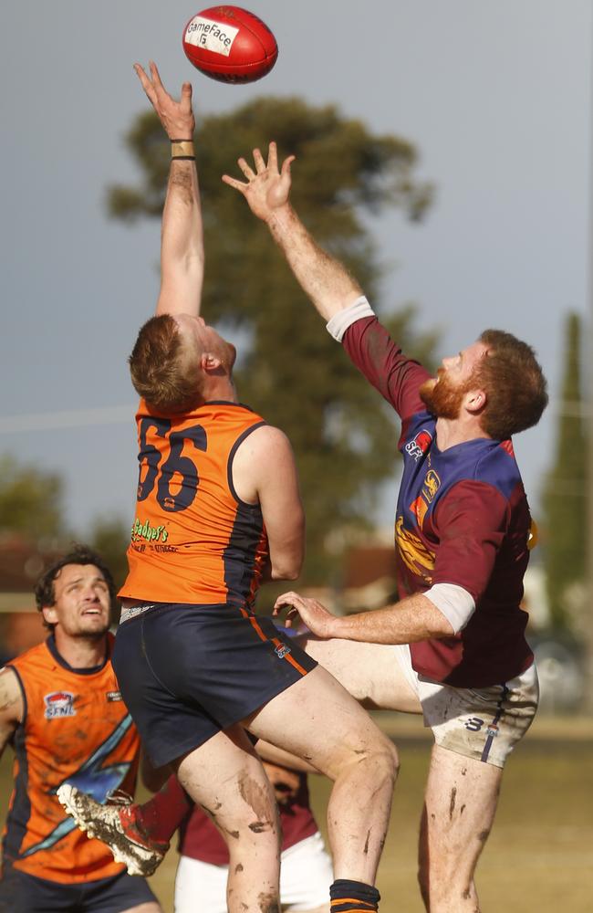 Julian Belfrage (right) in a ruck contest.