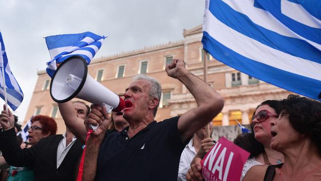 Pro-Euro protesters gather in front of the parliament building in Athens.