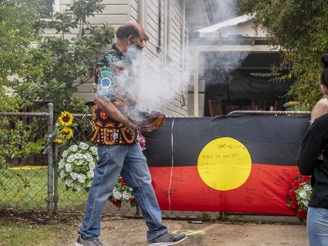 Alan Martin, Gungarri spiritual healer performs the smoking ceremony for Steven Nixon-McKellar in Stone St. Thursday, October 14, 2021. Picture: Nev Madsen.