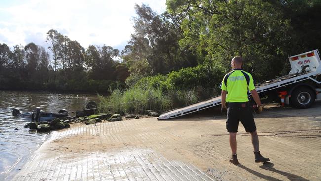 A car is towed from Floyds Bay Baot Ramp, Lansvale as part of the investigation into CTP fraud claims. Picture: Supplied