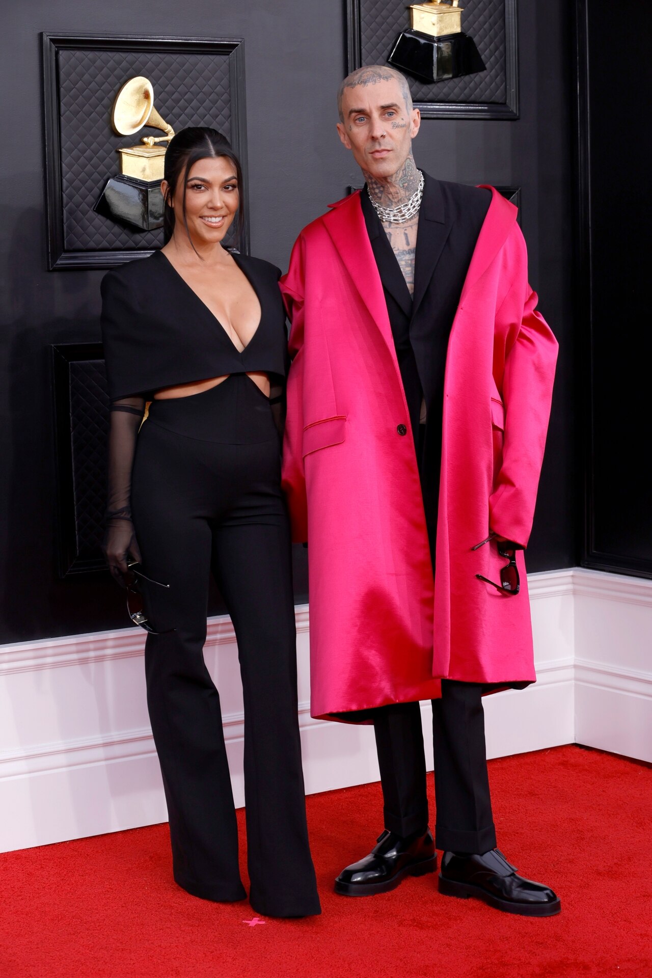 <h2>Kourtney Kardashian and Travis Barker</h2><p>In early April, the news broke that everyone’s favourite (or, at least, most-watched) goth-adjacent, PDA-loving couple had <a href="https://www.vogue.com.au/celebrity/news/kourtney-kardashian-travis-barker-married/news-story/78a01472682c2e176e3742defafd538d">tied the knot</a>. According to <i>People</i>, the couple were married in Vegas, at the iconic One Love Wedding Chapel, shortly after attending the Grammys. Wearing the same outfits they wore on the red carpet, the couple said their vows before an Elvis impersonator—a must, according to the chapel’s owner. “They paid and they requested Elvis Presley, that was mandatory. I called back five minutes later and was like, I got an Elvis, and there they were.” The pair followed it up with a <a href="https://www.vogue.com.au/brides/news/kourtney-kardashian-travis-barker-wedding-italy/image-gallery/6f265e0e2ba16343600a27dd8a061930" target="_blank" rel="noopener">more lavish ceremony in Italy</a> in front of family and friends. Kardashian officially changed her name to Kourtney Kardashian Barker after the wedding. </p>