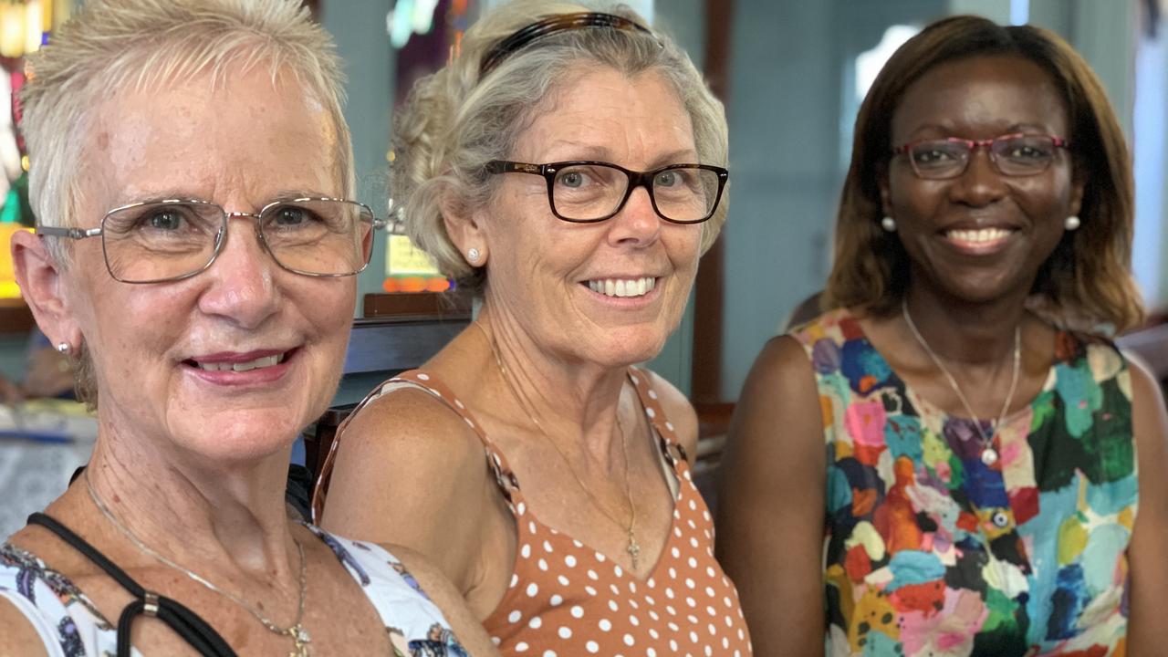 (From left to right) Robyn Abbott, Jane Deguara and Vara Ncomanzi sit together in the pews at St Paul’s Uniting Church on Saturday. Picture: Duncan Evans