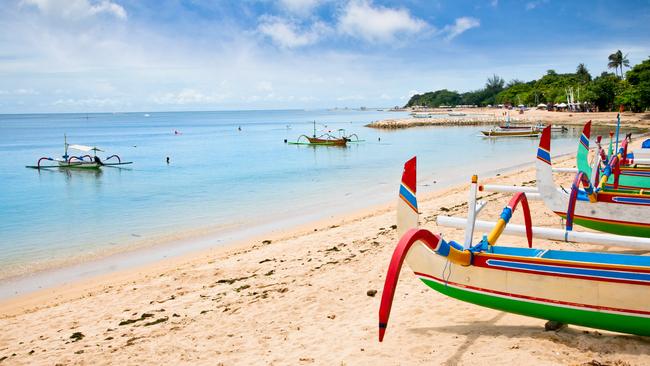 OCTOBER 26 2014 DEALS Traditional fishing boats on a beach in Nusa Dua on Bali. Indonesia.