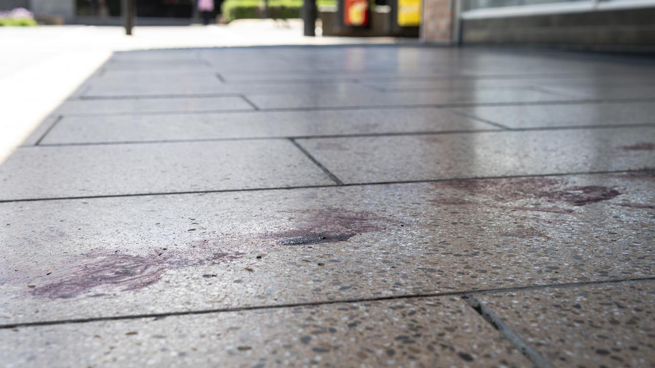 The intersection of Ruthven and Russell Sts in the Toowoomba CBD where a person was assaulted, unconfirmed blood stains are seen on the pavement, Sunday, November 24, 2024.