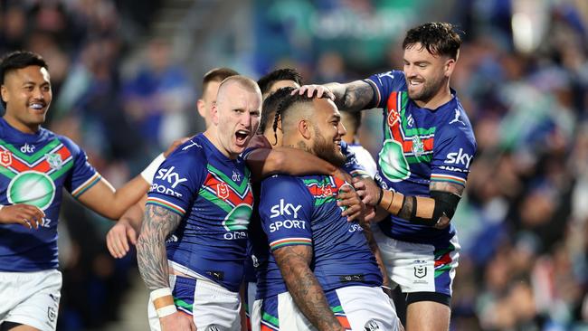 The Warriors celebrate after Addin Fonua-Blake scored during a 12-minute blitz. Picture: Getty Images