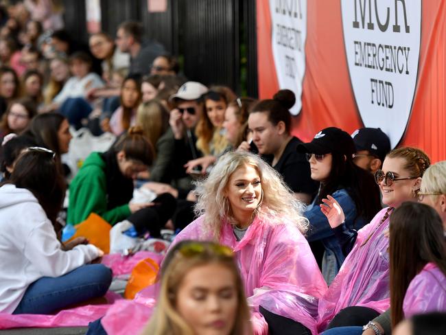 Concertgoers queue outside Old Trafford Cricket Ground ahead of the One Love Manchester tribute concert in Manchester. Picture: AFP/Anthony Devlin