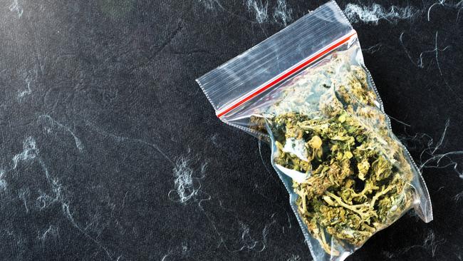 A bank bag of cannabis against a black and white background with copy space.  Picture: istock