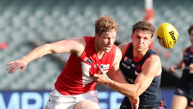 Peter Bampton (right) battles Harrison Wigg in the SANFL. Picture: Sarah Reed