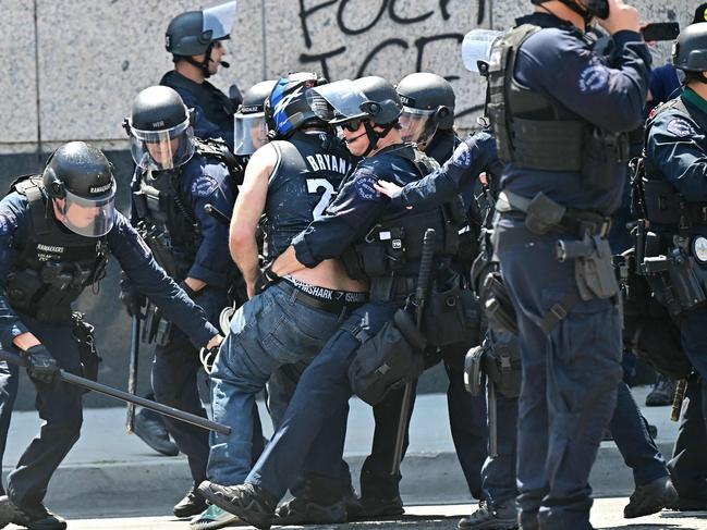 Law enforcement clash with demonstrators outside the Metropolitan Detention Center, MDC, in downtown Los Angeles, California. Picture: AFP