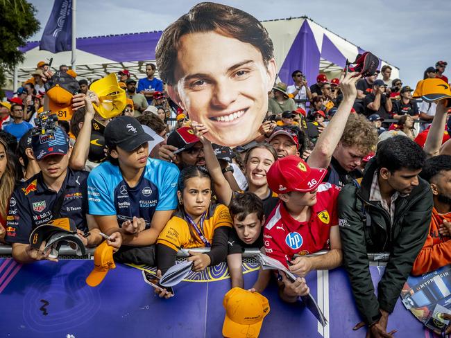 Fans show their love for Oscar Piastri. Picture: Jake Nowakowski