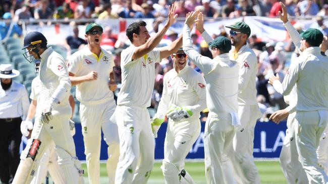 Mitchell Starc celebrates with teammates. Picture: AAP.