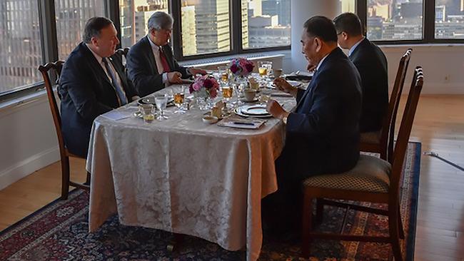 Mike Pompeo, left, and Kim Yong-chol, right, have dinner in New York. Picture: AFP