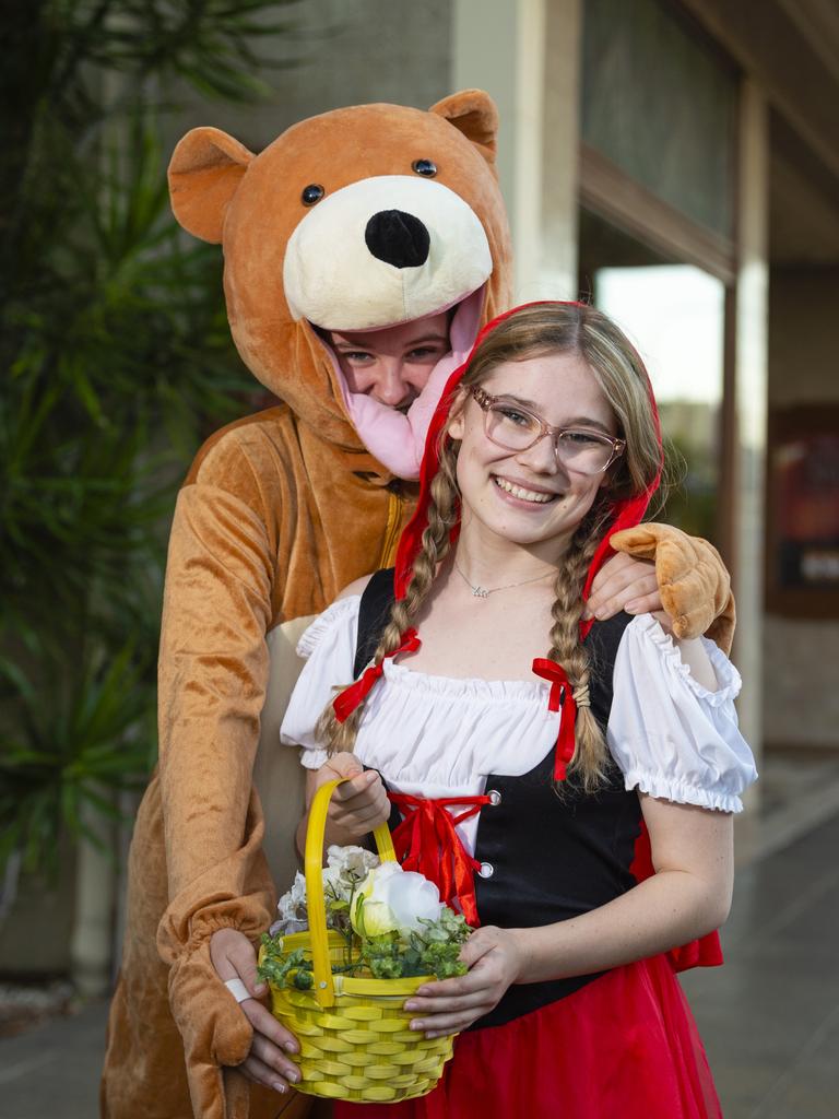 Ella Everest (left) and Caitlin Croft of Dance Central outside the Curious Arts Festival to attract visitors to the Empire Theatres, Saturday, April 2, 2022. Picture: Kevin Farmer