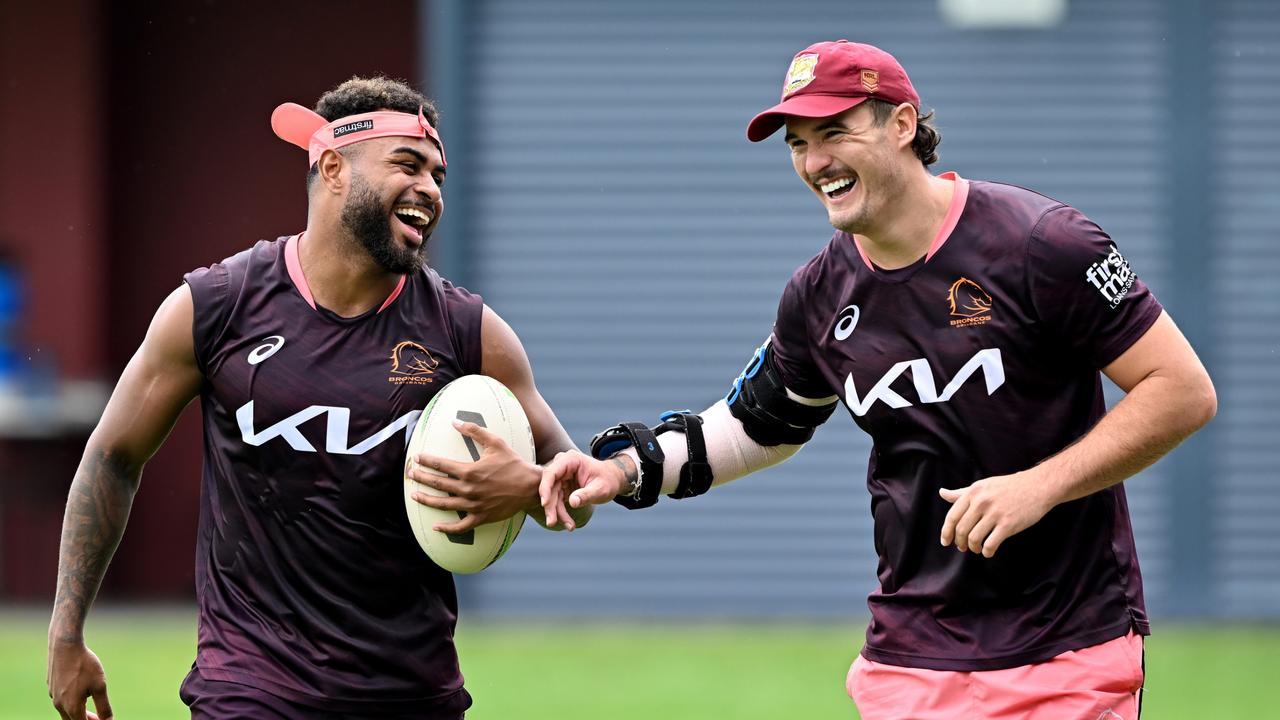 Broncos five-eighth Ezra Mam with Kobe Hetherington. Picture: Bradley Kanaris/Getty Images