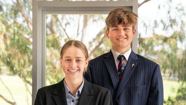 St Ignatius' College captains Imogen Baily and John Dwyer dressed as the principal when they switched roles on May 7.