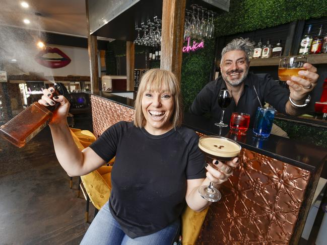 Macleod hairdresser Frank Ciccone, pictured with wife, Helen, is transforming his salon of 25 years into a bar. Picture: Alex Coppel