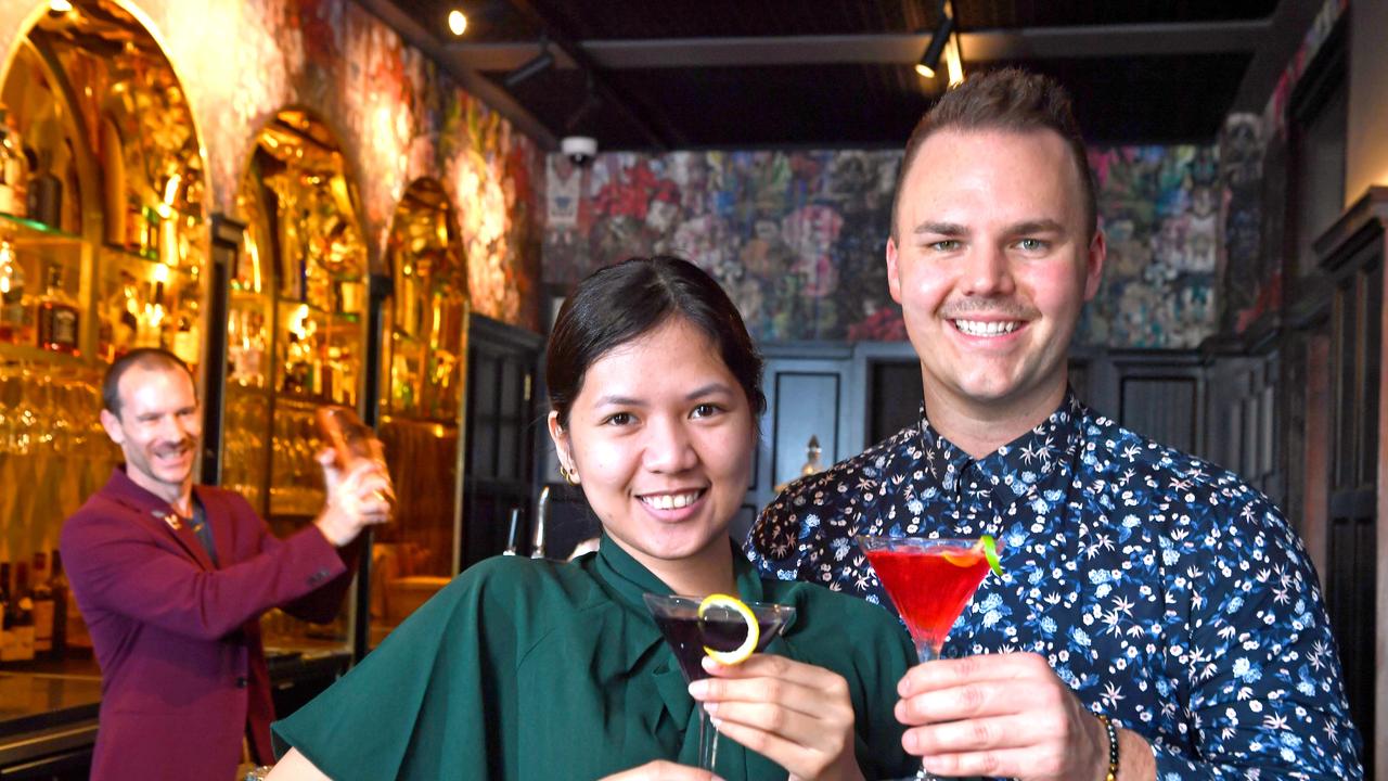 Ivan Maxwell and Marvie Luna enjoy a drink at Inchcolm by Ovolo with GM and Bartender Nathan Dean. Ovolo group director of marketing Stephen Howard said the certainty of Queensland’s reopening was having a great impact on bookings. Picture: John Gass