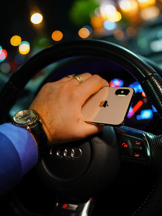 Confusing messaging has left drivers in the dark about how to use mobile phones. Picture: News Regional Media