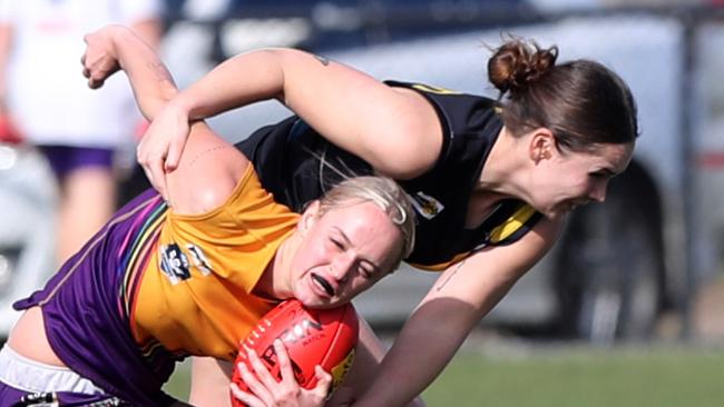 Torquay's Cassie Koschel lays a strong tackle. Picture: Alan Barber