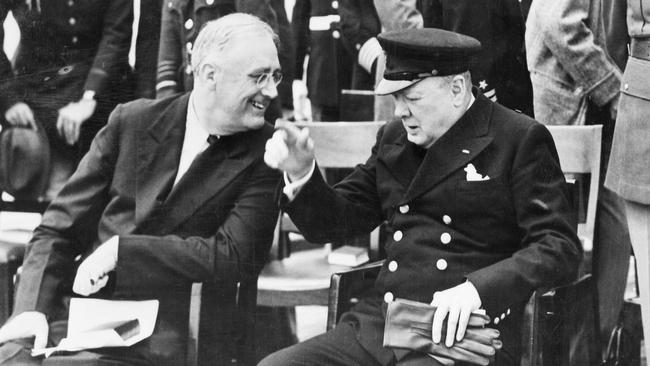 Franklin D. Roosevelt and Winston Churchill at the Atlantic Charter meeting aboard the battleship HMS Prince of Wales.