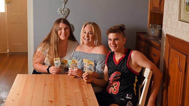 Mother-of-two Danielle Smith uses a Christmas Club account to stash money throughout the year for Christmas spending. Pictured with son Thomas, 14, and niece Georgia Gower, 17.