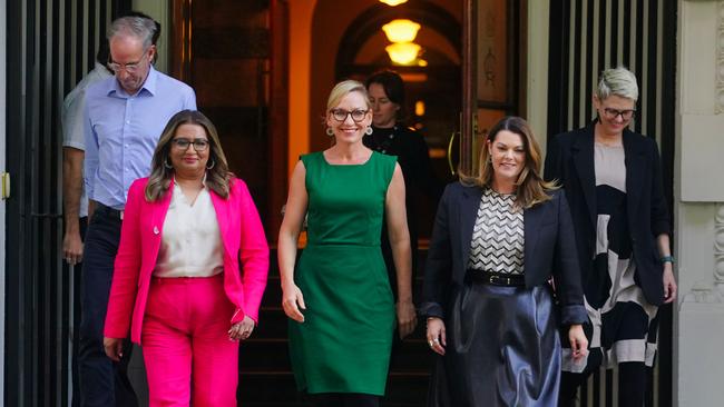 Mehreen Faruqi (left), newly elected Greens leader Larissa Waters (C) , and Senator Sarah Hanson-Young (R) walk out of their election meeting in Melbourne. Picture: NewsWire / Luis Enrique Ascui