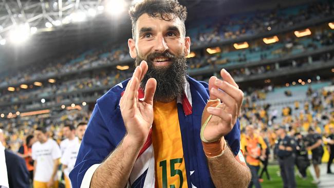 Captain Mile Jedinak celebrates after beating Honduras. Picture: AAP Images