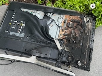 A TV set dragged from a house in Violet Ave, Forestville, that was damaged by fire at 10.30am on Tuesday. Picture: NSW Fire and Rescue