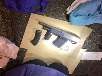 A firearm, ammunition and drugs were found in a car a duo were travelling in at Tugun border checkpoint on Wednesday night.